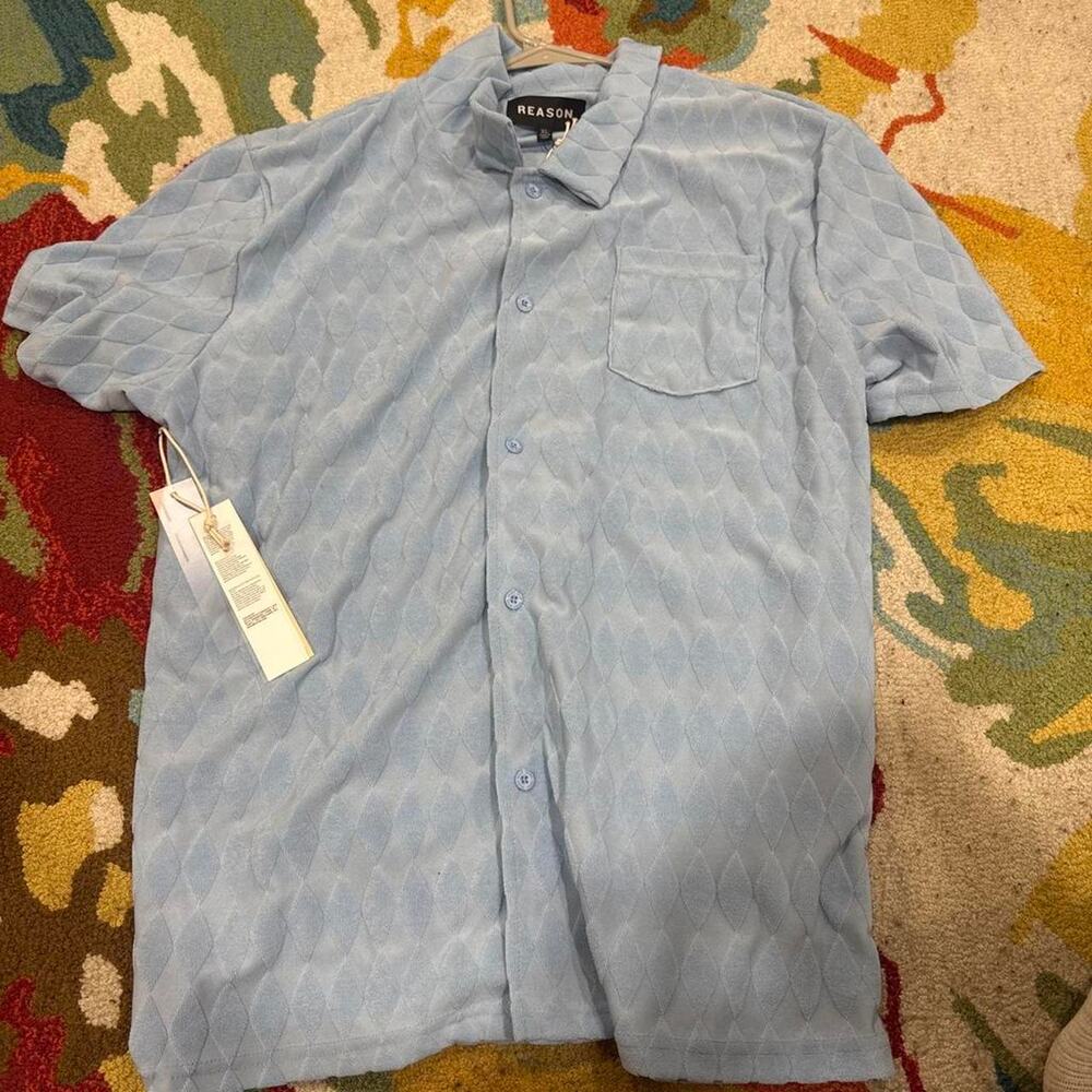 Blue button up shirt with diamond